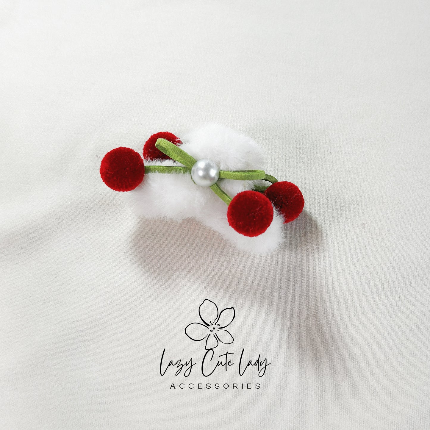 Small Plush Hair Claw with Bow and Red Fuzzy Ball