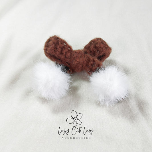 Knitted Bow Hair Clip with Plush White Ball Accent