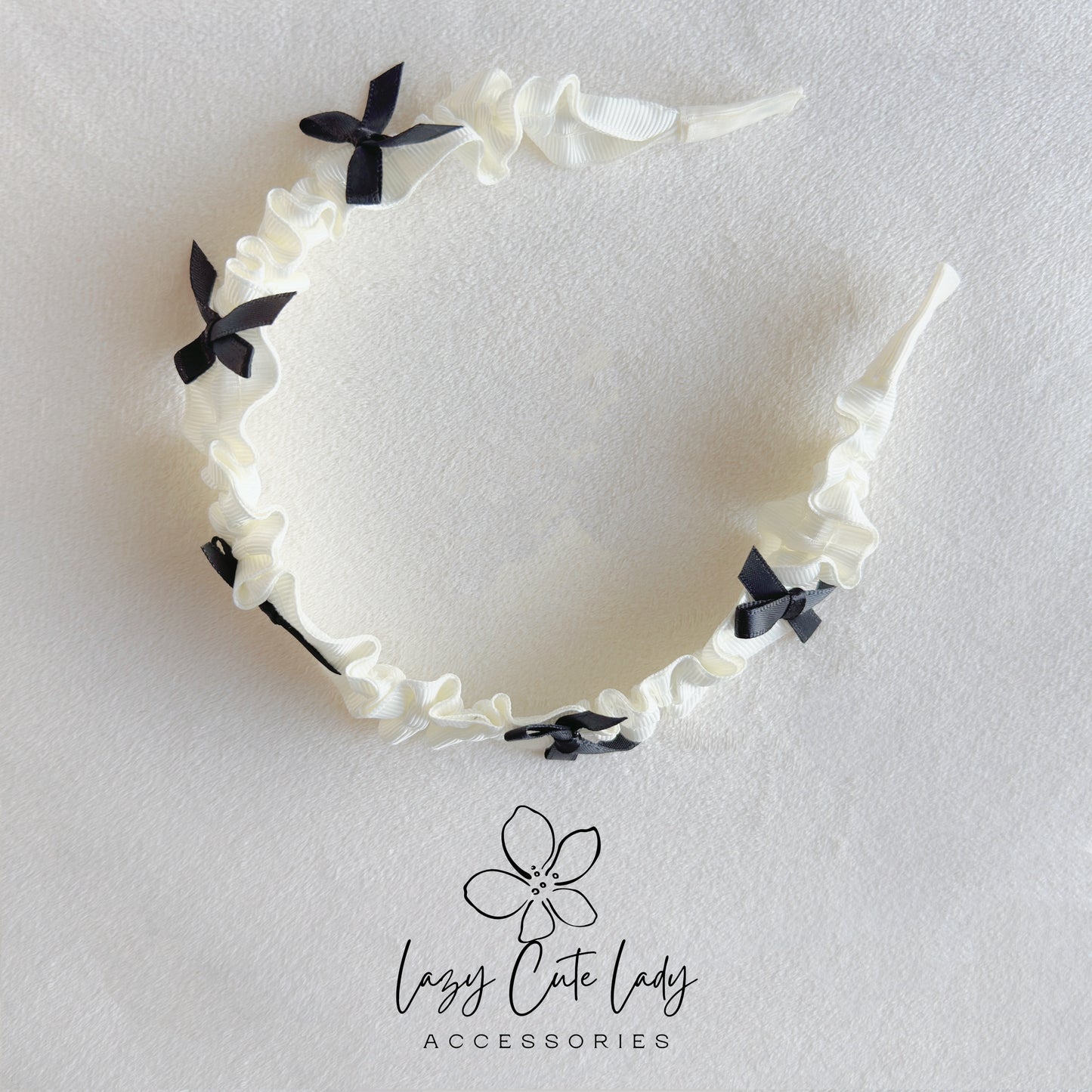 Elegant White Fabric Headband with Black Mini Bow – Classic & Chic Hair Accessory