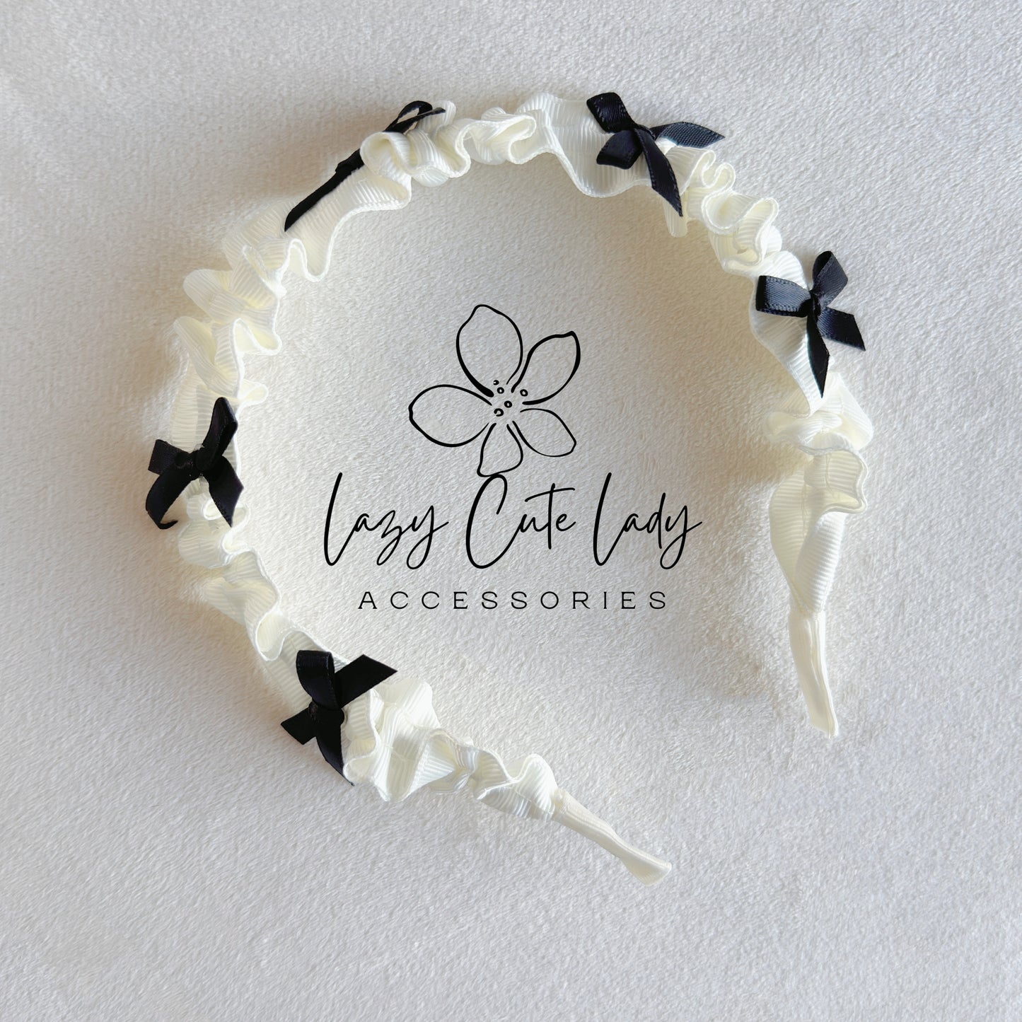 Elegant White Fabric Headband with Black Mini Bow – Classic & Chic Hair Accessory