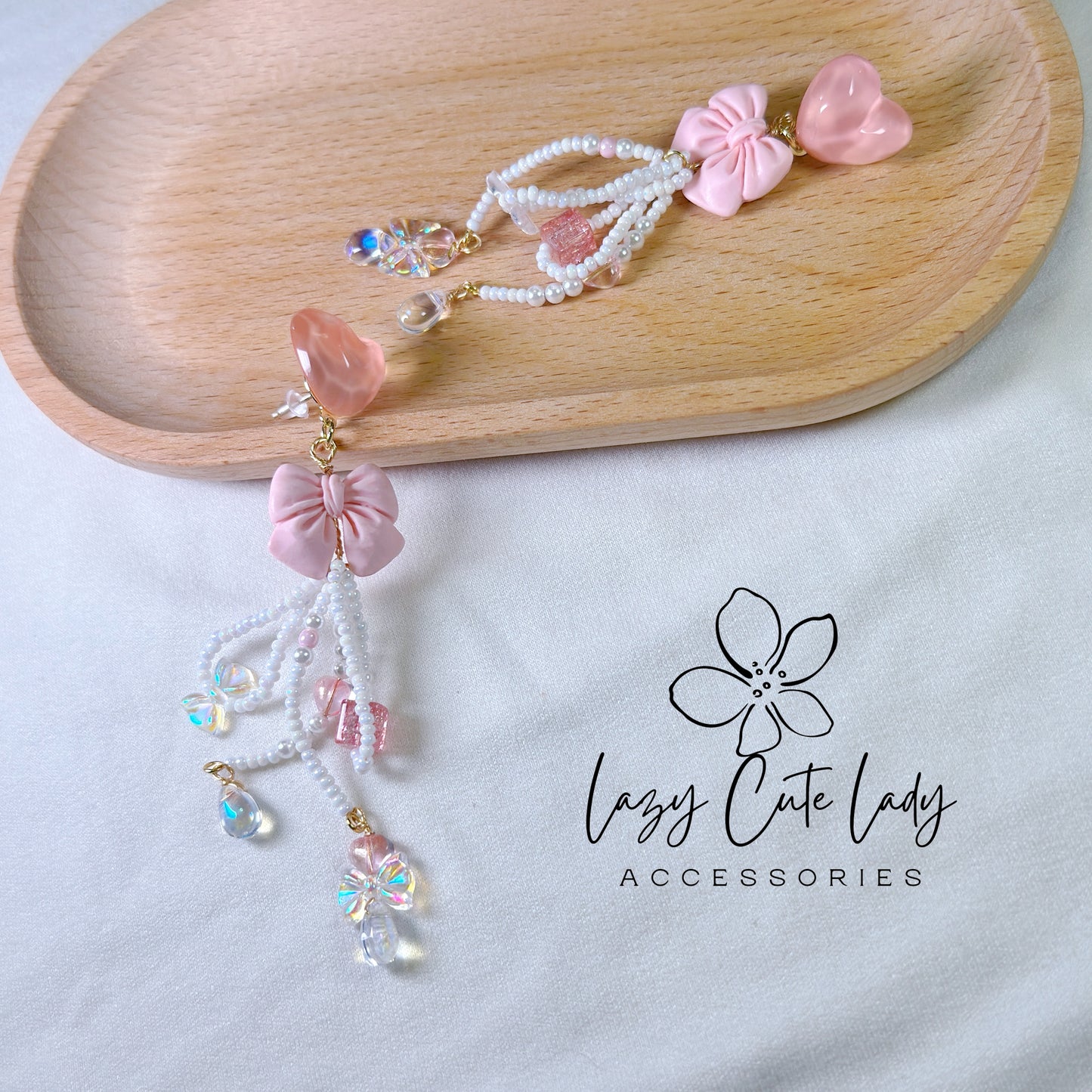 Pink Love Delight: Handcrafted Heart and Bow Earrings with Creative Bead Accents