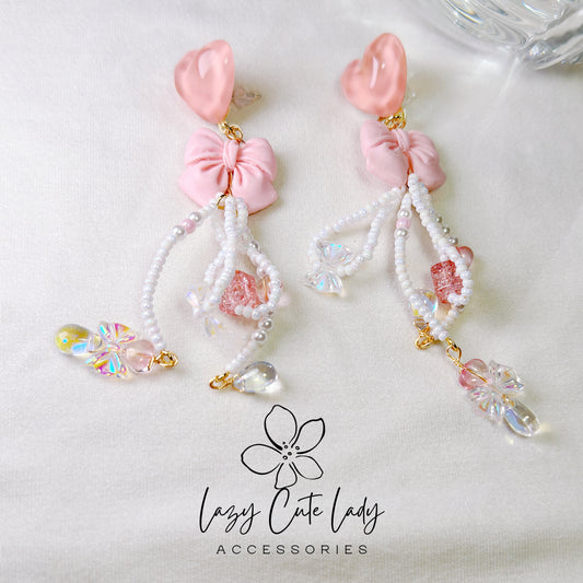 Pink Love Delight: Handcrafted Heart and Bow Earrings with Creative Bead Accents