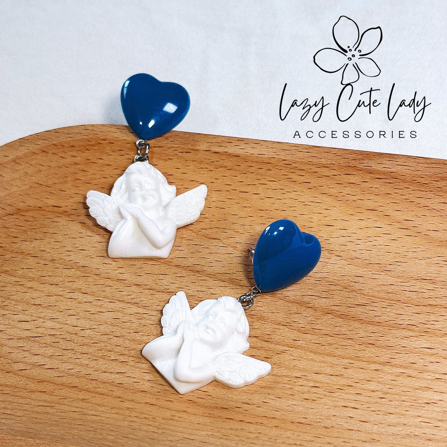 Exquisite Navy Blue Heart and White Angel Earrings