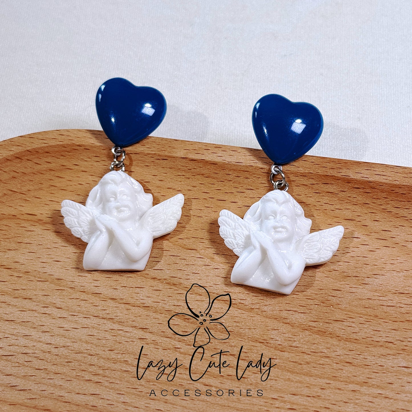 Exquisite Navy Blue Heart and White Angel Earrings