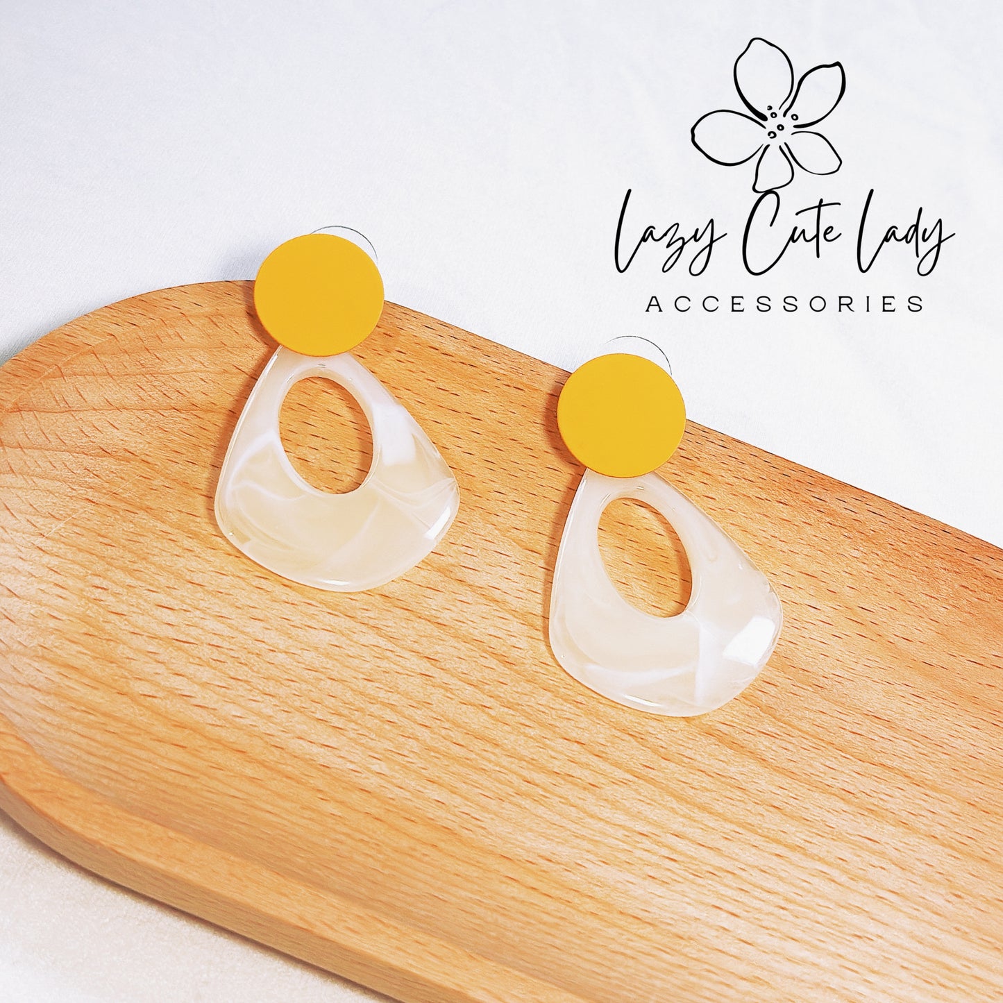Chic Geometric Acetate Earrings with Orange and Beige Drops