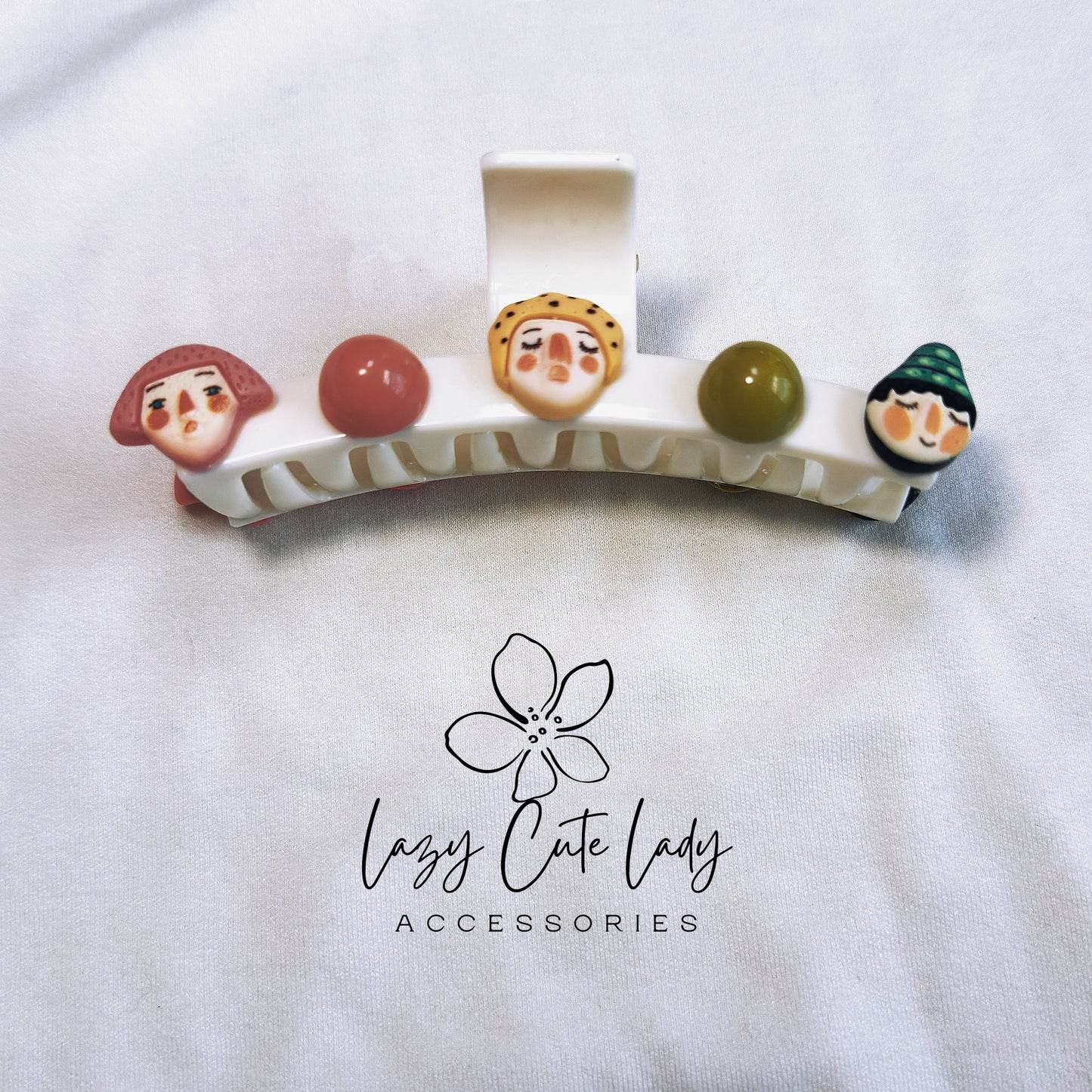 Adorable Clay Cartoon Doll and Candy-Themed Hair Claw