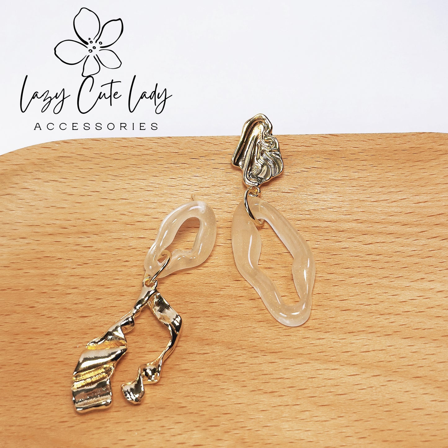 Asymmetrical Gold and Resin Earrings - Elegant and Fashionable Design